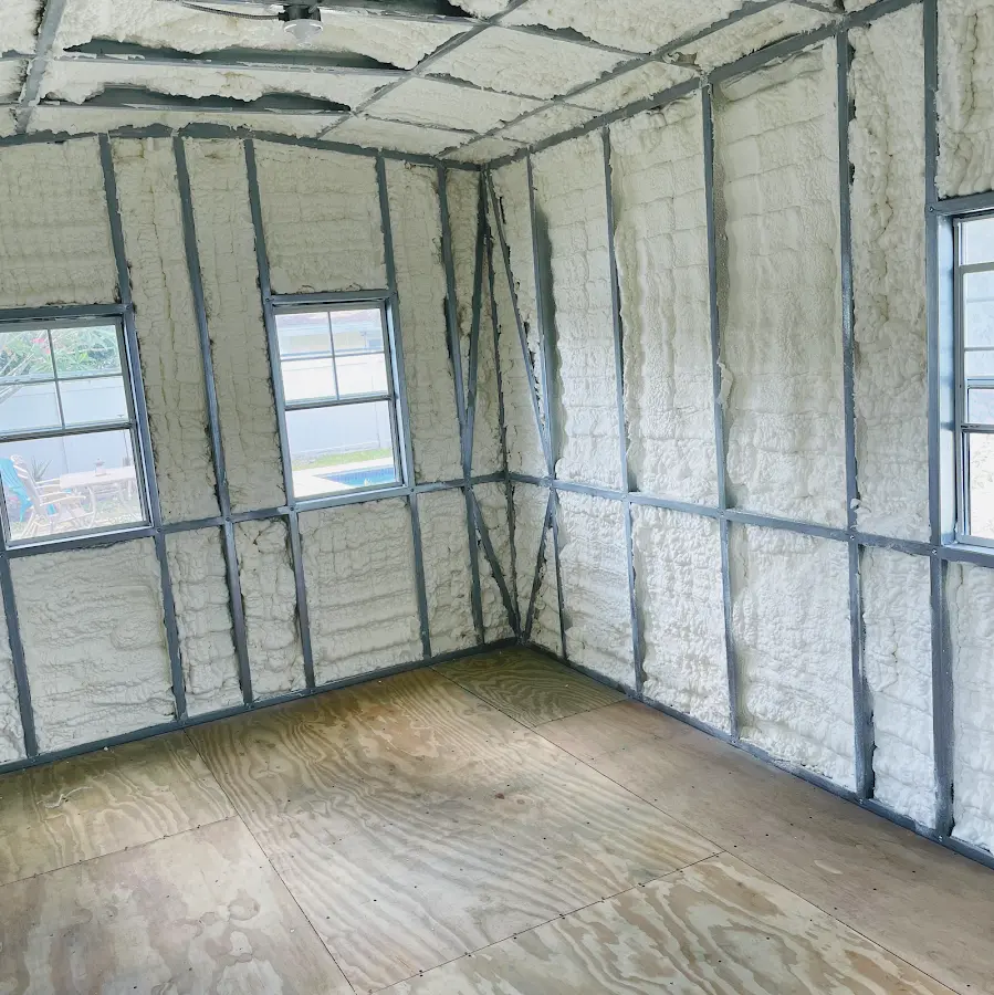 Closed-cell spray foam insulation applied to wall cavities in a residential project in Sumner